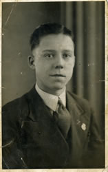 A young Frank Plaister proudly wearing his Merchant Navy badge.