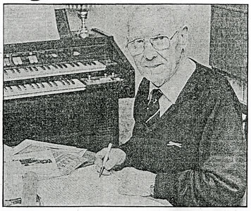 Jim Everson working on his POW records. Picture from an old photocopy of the Western Mail March 12 1988.