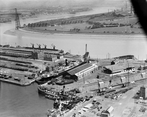 View of a ship in the Alexandra Dry Dock, which used to be the entrance lock.