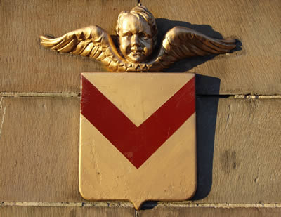 Newport Town Bridge is decorated with several plaques showing simplified versions of the City Council’s coat of arms, with the unusual feature of a cherub appearing above the shield of arms. The arms show a gold shield with the red chevron in reverse, based on the arms of the Stafford family that provided the lords of the Manor in the late Medieval period. The bridge plaque featured on the cover for the record ‘Love Spreads’ by the band The Stone Roses, released in 1994.