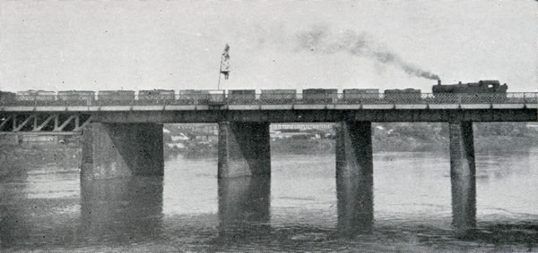 Up mineral train crossing the River Usk bridge at Newport, which was widened on the northern side when two additional tracks were laid in 1925