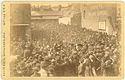 Can you date this picture or identify the visitor who has drawn this crowd outside Newport Railway Station?