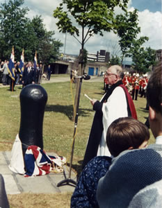 The Dean of Monmouth, Rev. Frank Jenkins, dedicates the memorial to Commander JW Linton.
